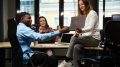 African American man and caucasian women working on logo development
