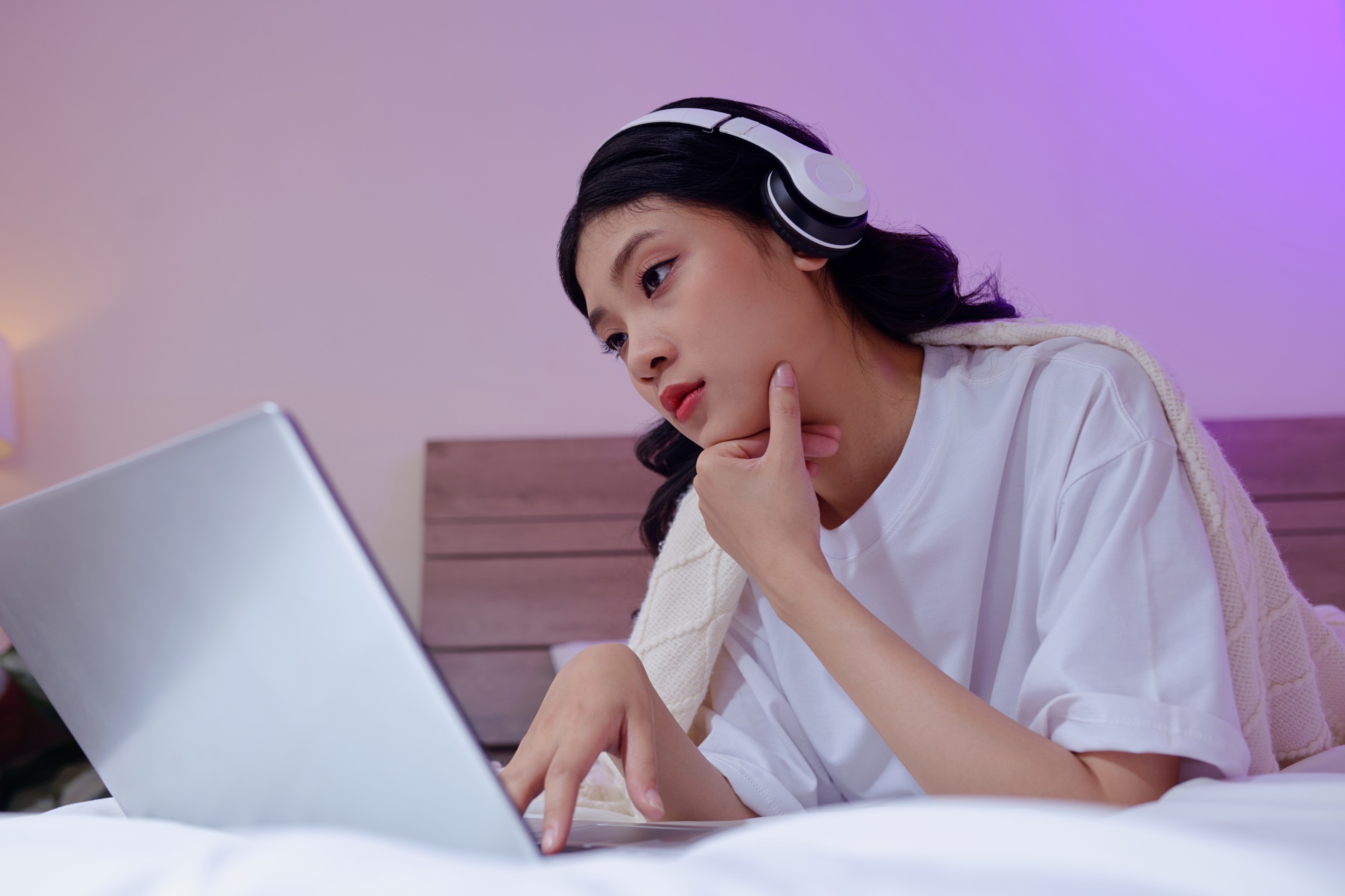 Blogger in Headphones Editing Video