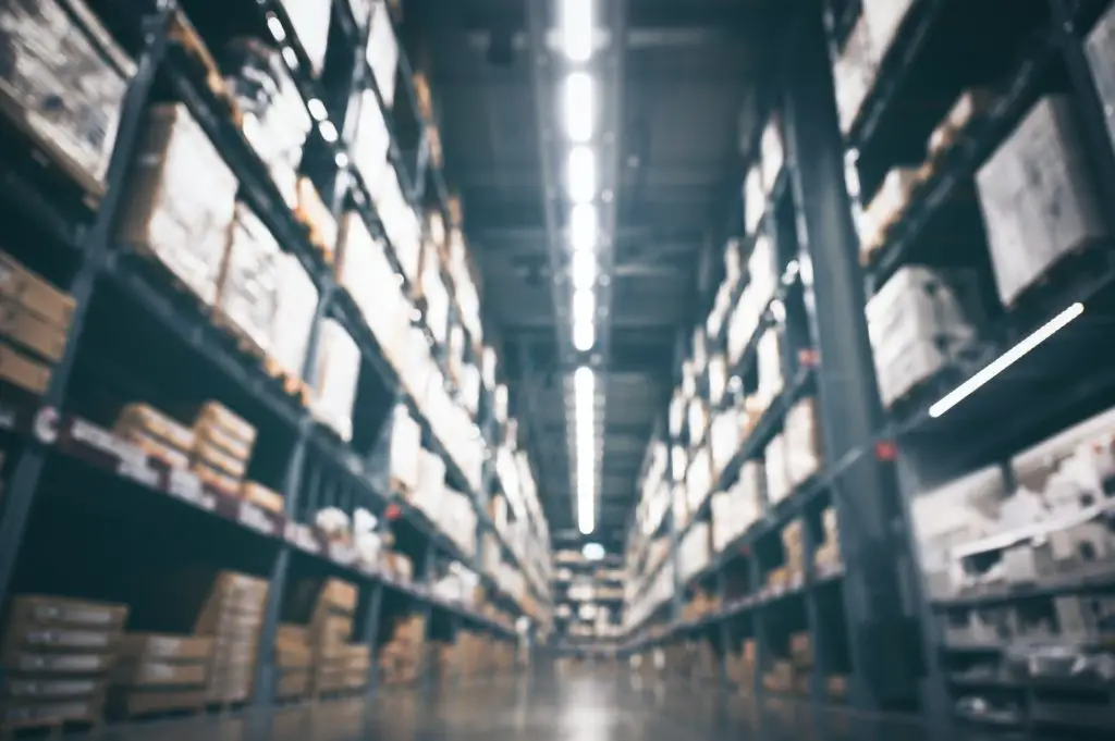 Blurry background of Warehouse inventory product stock for logistic background