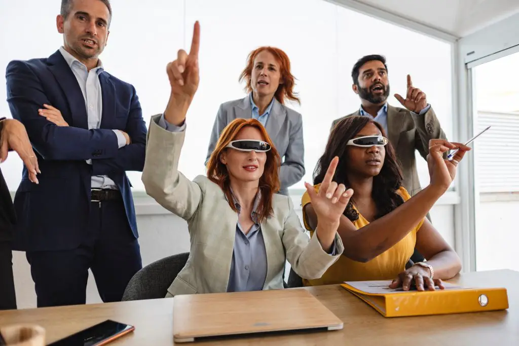 Business Team Exploring Augmented Reality Technology in Office Meeting