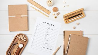 Desktop with planning template and office accessories