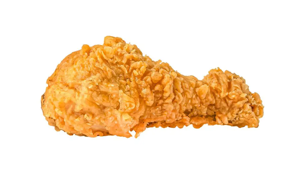 Fried chicken leg drumstick isolated on white background.