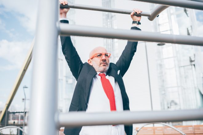 Middle age caucasian business man training outdoor