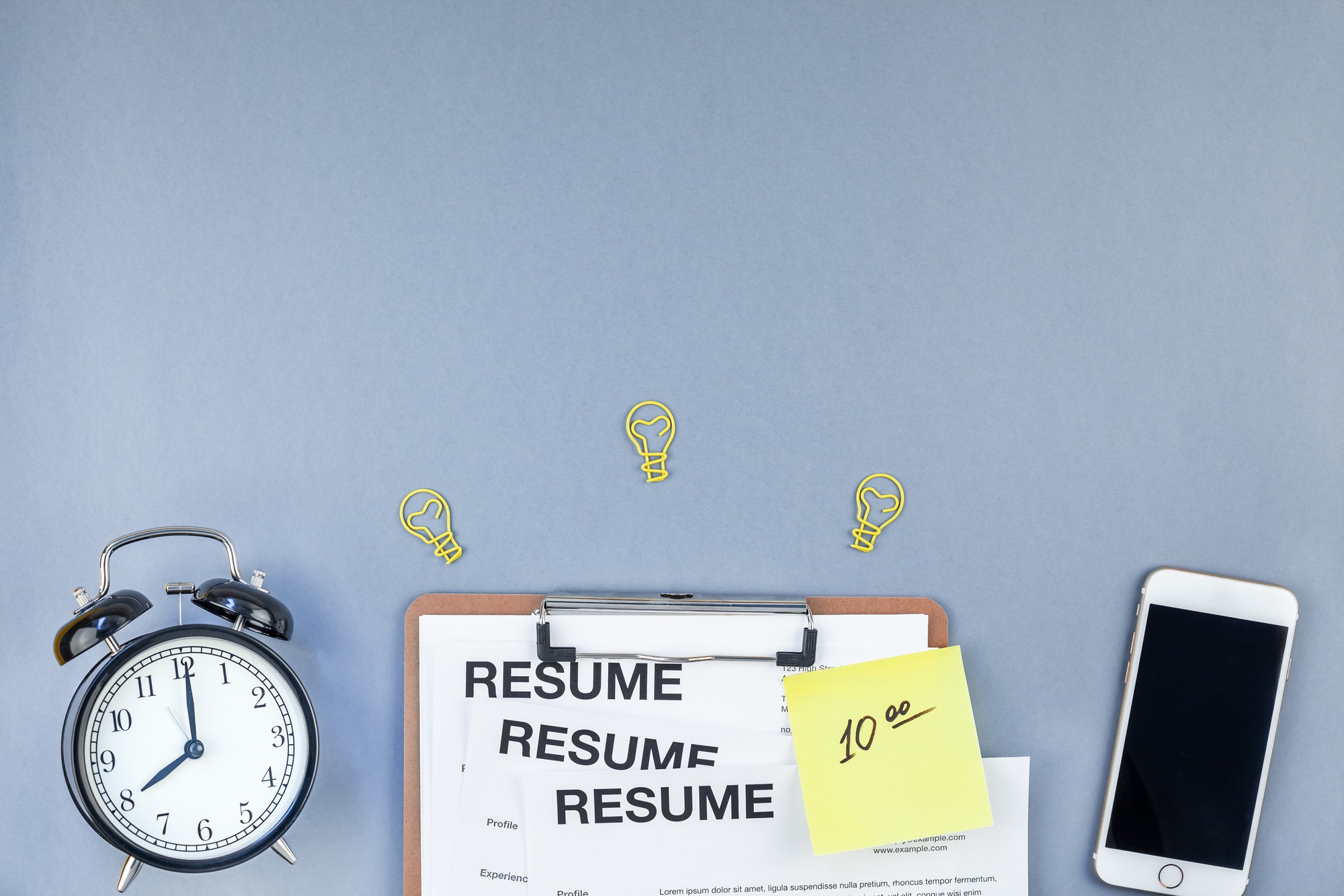 We are hiring flat lay on blue background